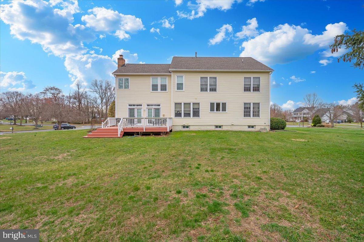 17900 Hickman Street Poolesville, MD 20837 - Photo 61 of 97 a view of a house with a yard