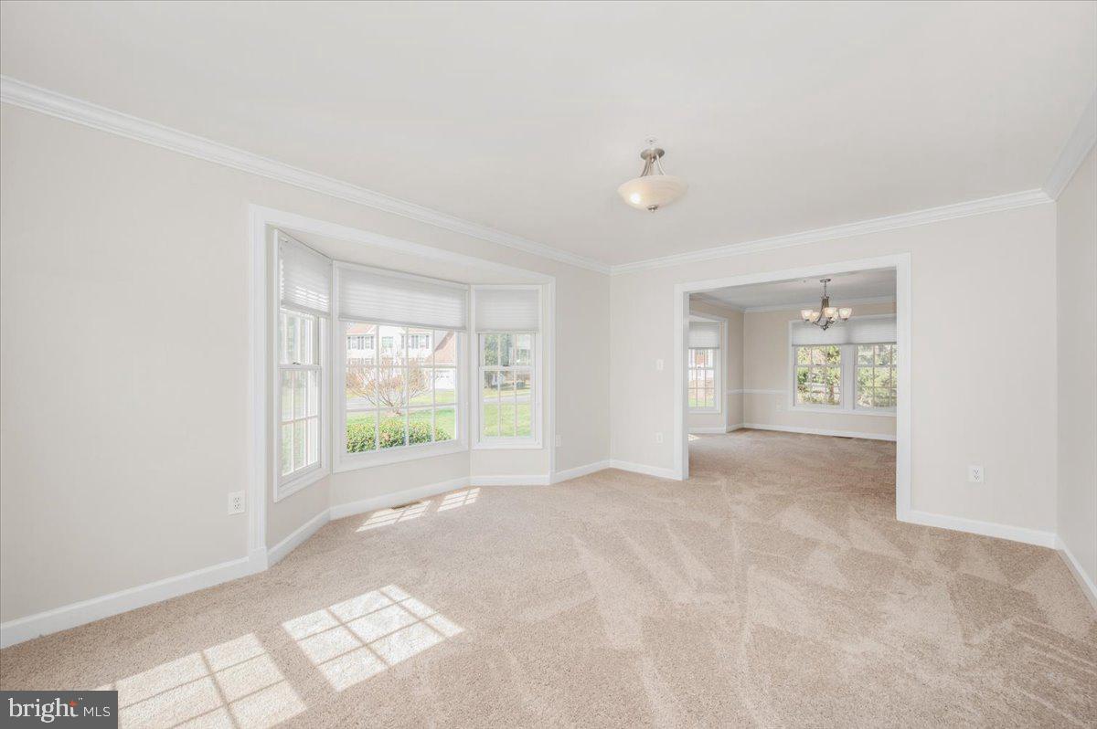 17900 Hickman Street Poolesville, MD 20837 - Photo 7 of 97 a view of an empty room with a window