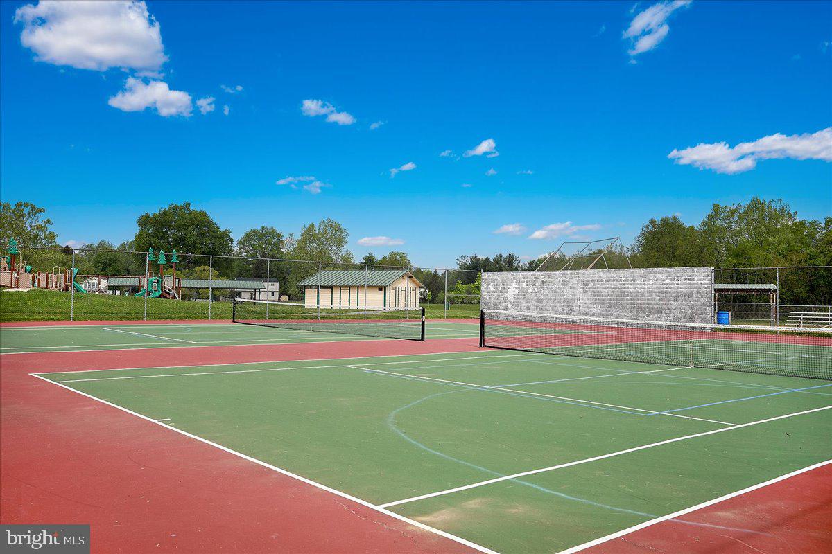17900 Hickman Street Poolesville, MD 20837 - Photo 94 of 97 a view of an outdoor space and tennis court