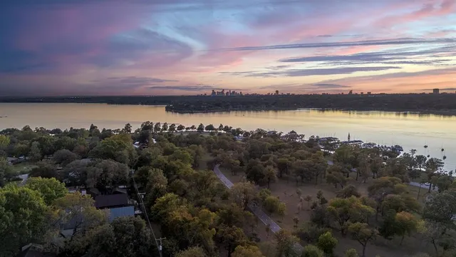 a view of a lake in middle of the town