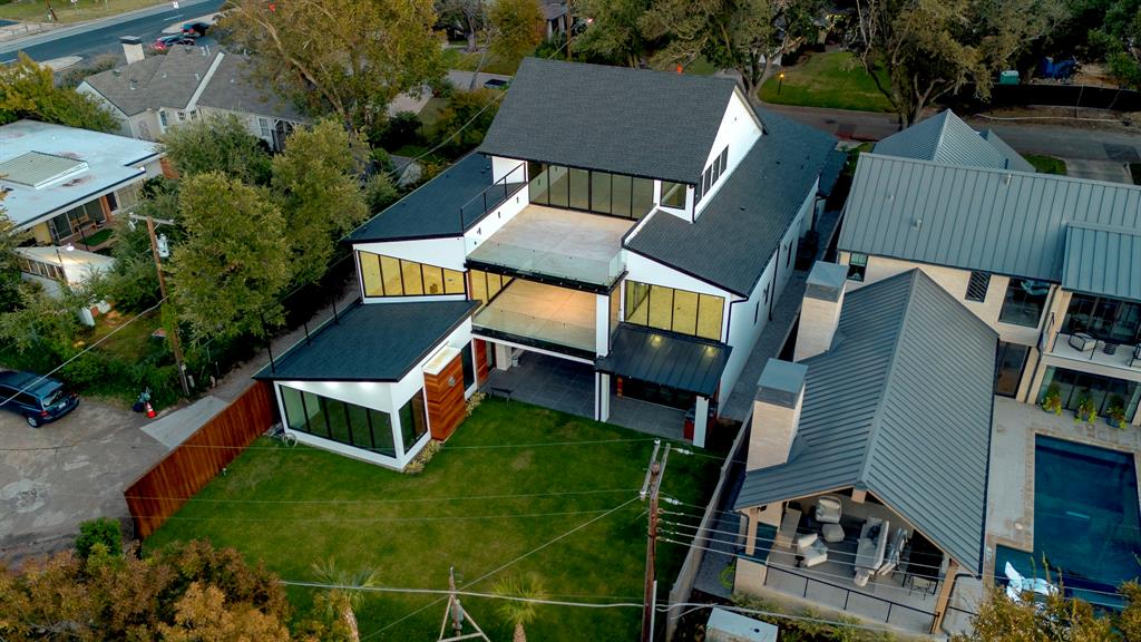 9457 Waterview Road Dallas, TX 75218 - Photo 6 of 19 an aerial view of houses with deck and outdoor seating