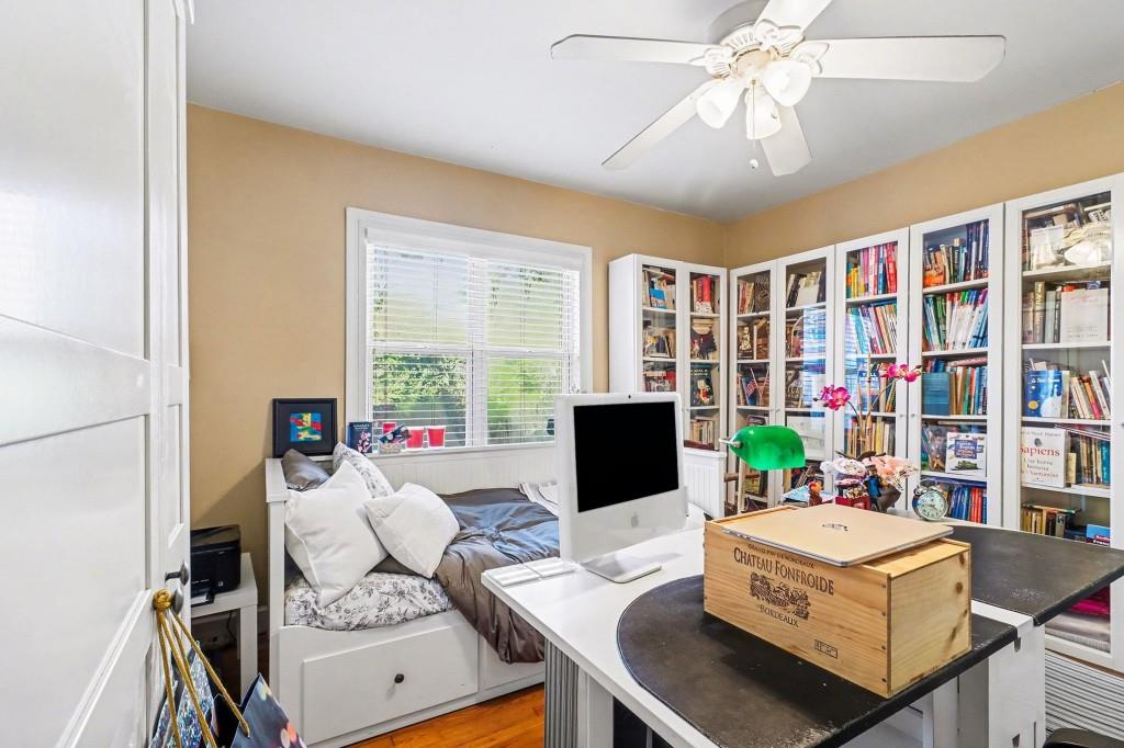 2477 North Decatur Road, Unit A1 Decatur, GA 30033 - Photo 19 of 29 a living room with furniture and a bookshelf