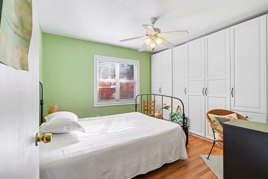 2477 North Decatur Road, Unit A1 Decatur, GA 30033 - Photo 5 of 29 a bedroom with a bed table and window
