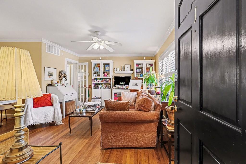 2477 North Decatur Road, Unit A1 Decatur, GA 30033 - Photo 9 of 29 a living room with furniture fireplace and a large window