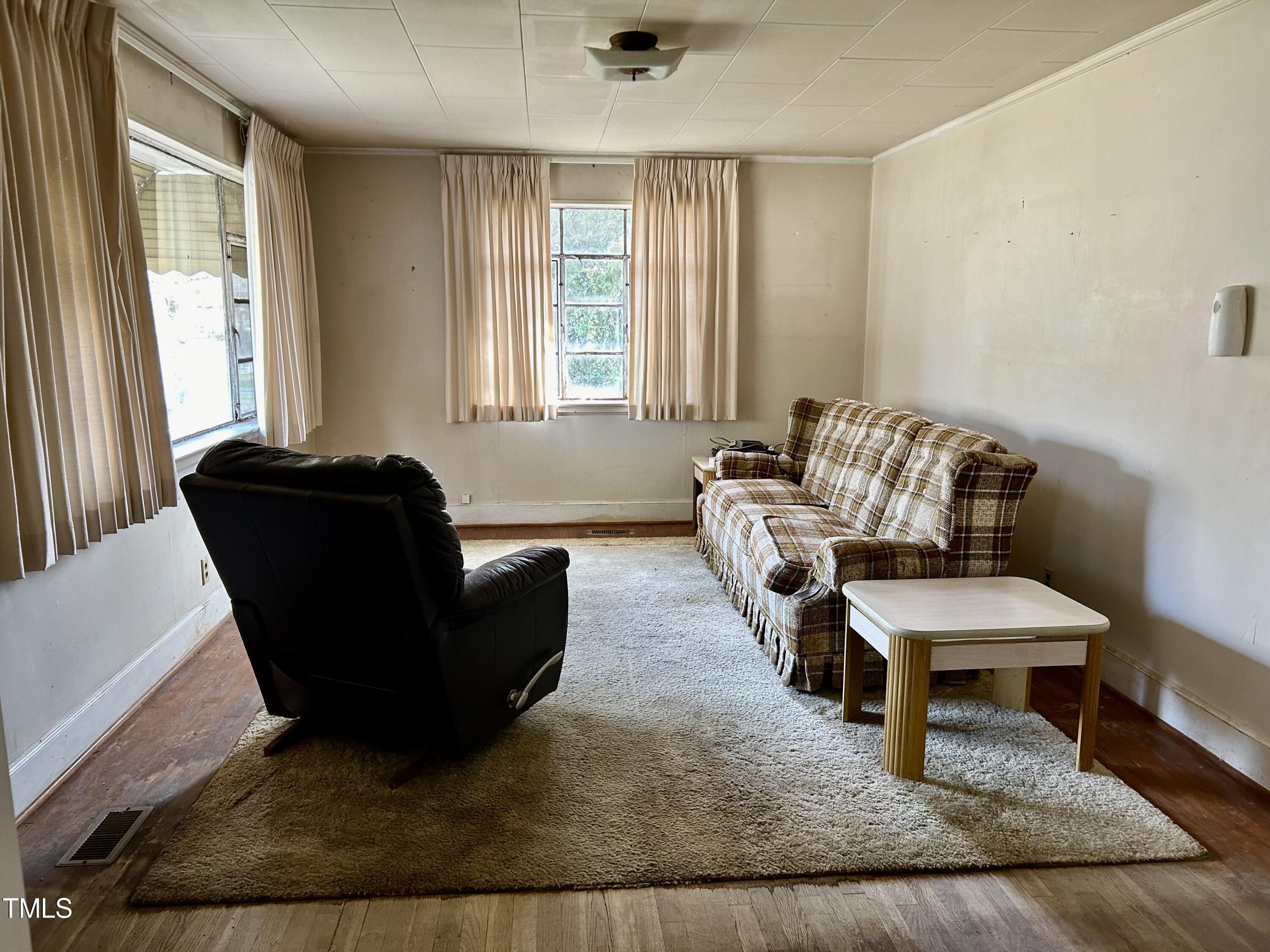 3526 Rose Of Sharon Road Durham, NC 27712 - Photo 2 of 11 a living room with furniture and a window