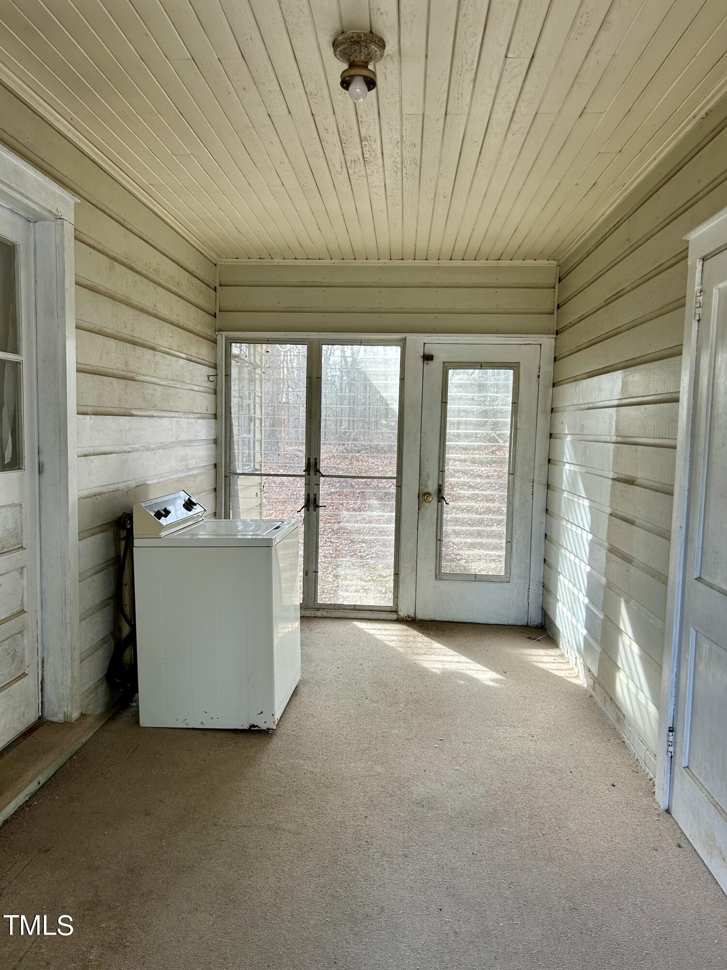 3526 Rose Of Sharon Road Durham, NC 27712 - Photo 5 of 11 a view of a room with a fireplace and a large window
