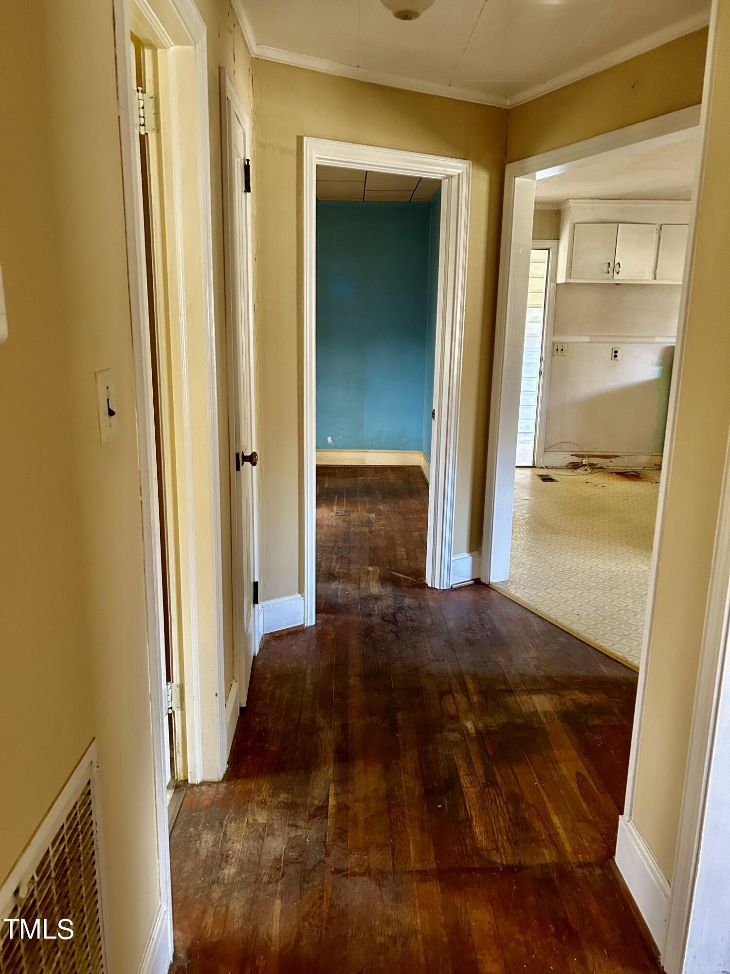 3526 Rose Of Sharon Road Durham, NC 27712 - Photo 6 of 11 a bedroom with a bed and wooden floor