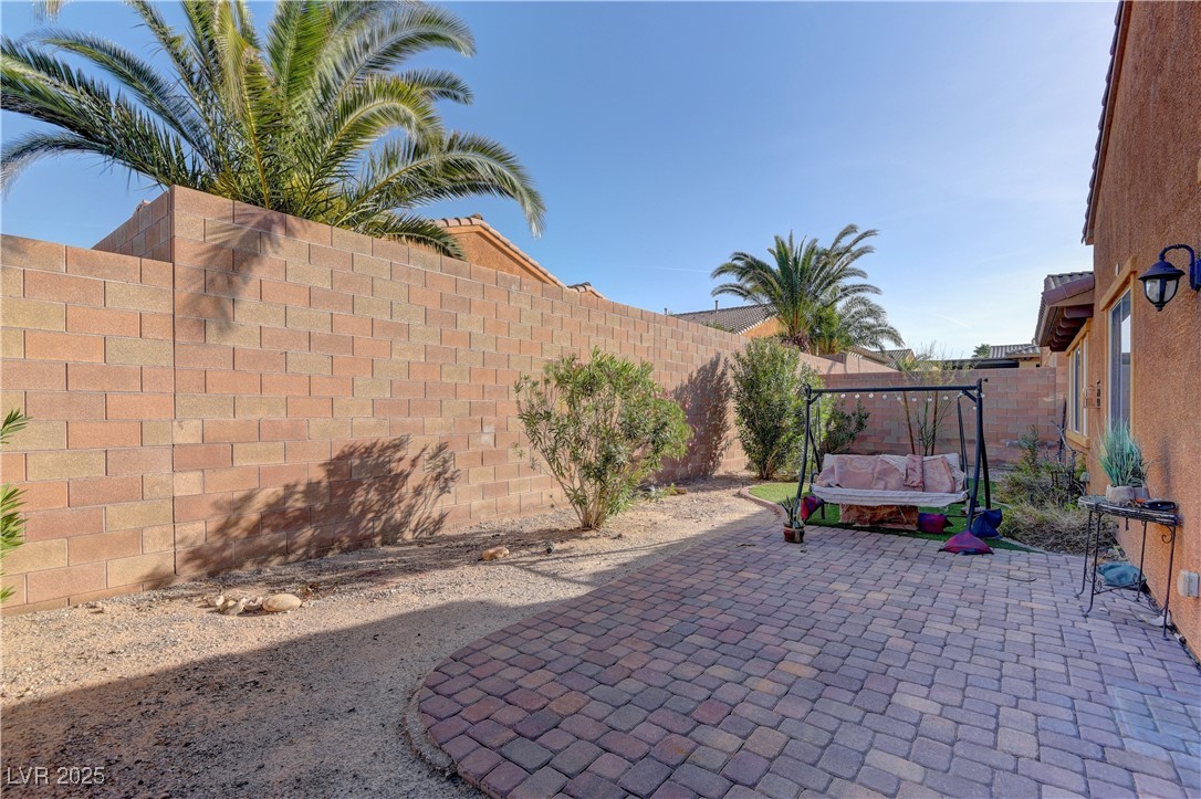 972 Rue Grand Paradis Lane Henderson, NV 89011 - Photo 26 of 32 Fenced backyard with a patio area