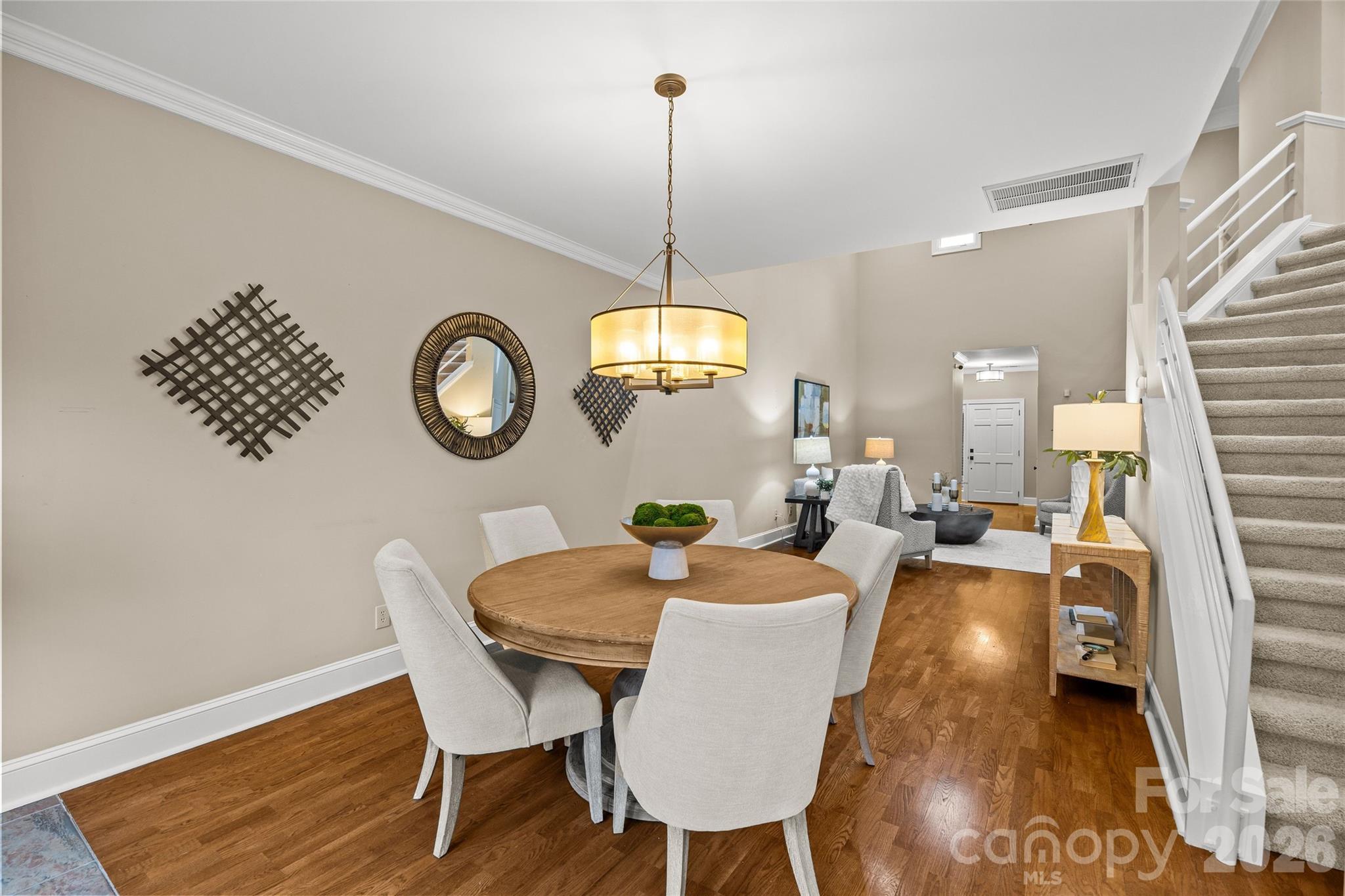 6029 Sharon Road Charlotte, NC 28210 - Photo 12 of 47 a view of a dining room with furniture window and wooden floor