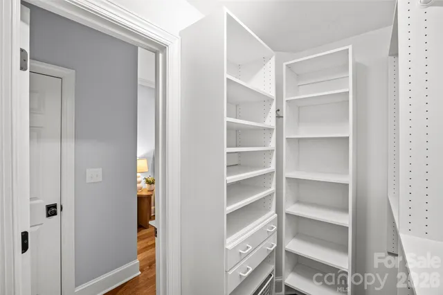 a bathroom with a tub and a shower