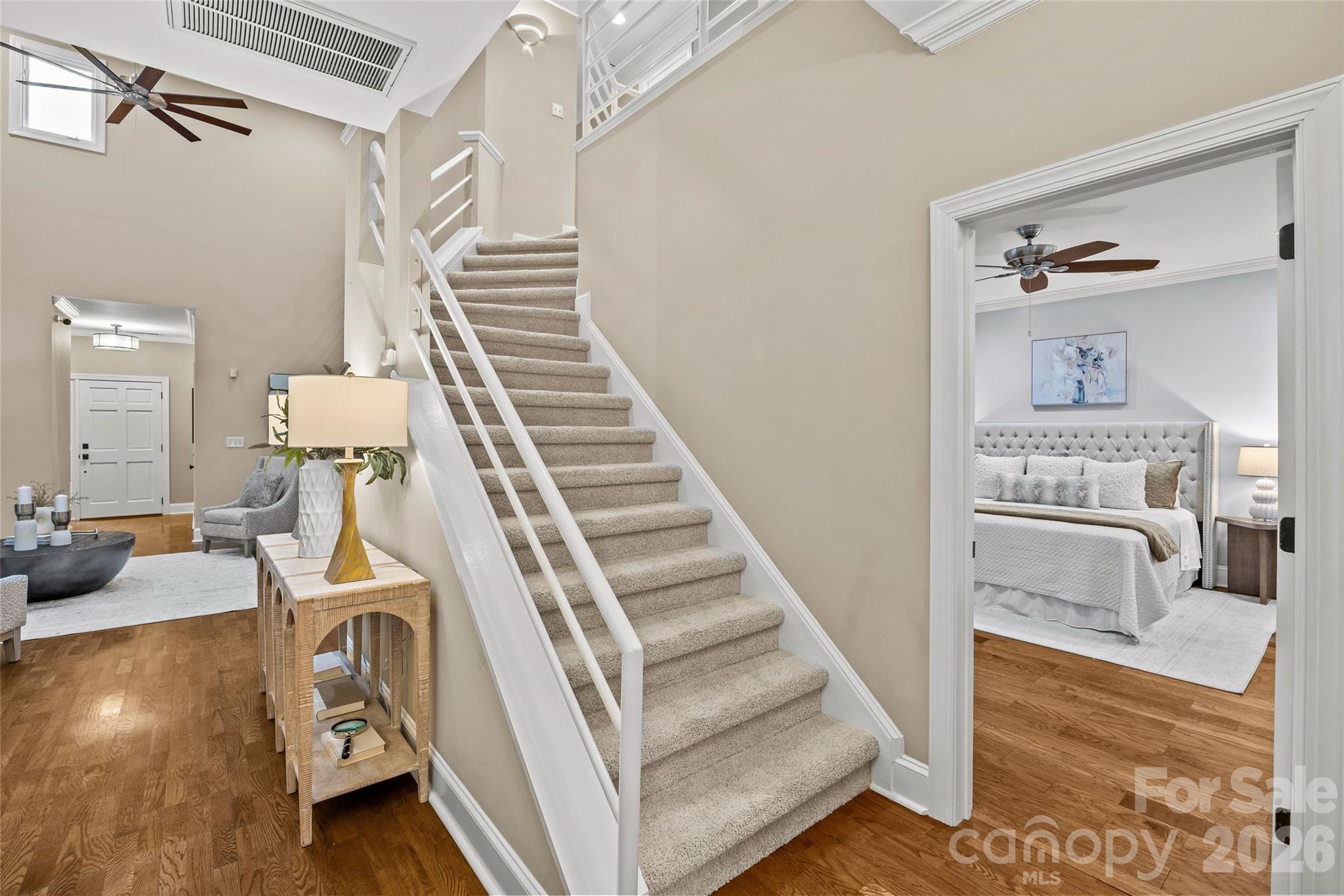 6029 Sharon Road Charlotte, NC 28210 - Photo 24 of 47 a view of a livingroom with furniture and staircase