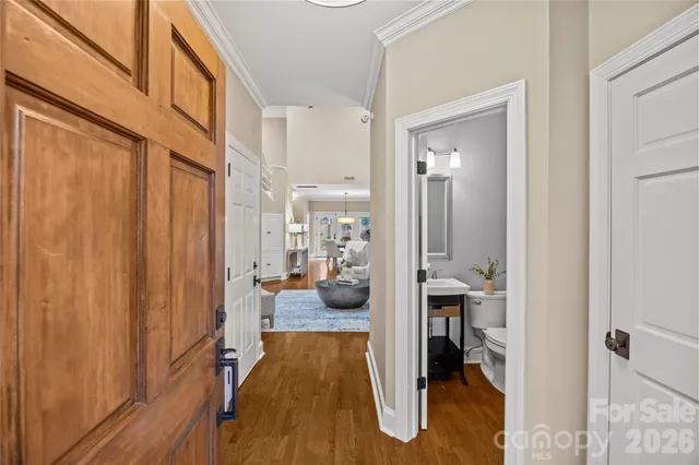 a view of a bathroom with wooden floor