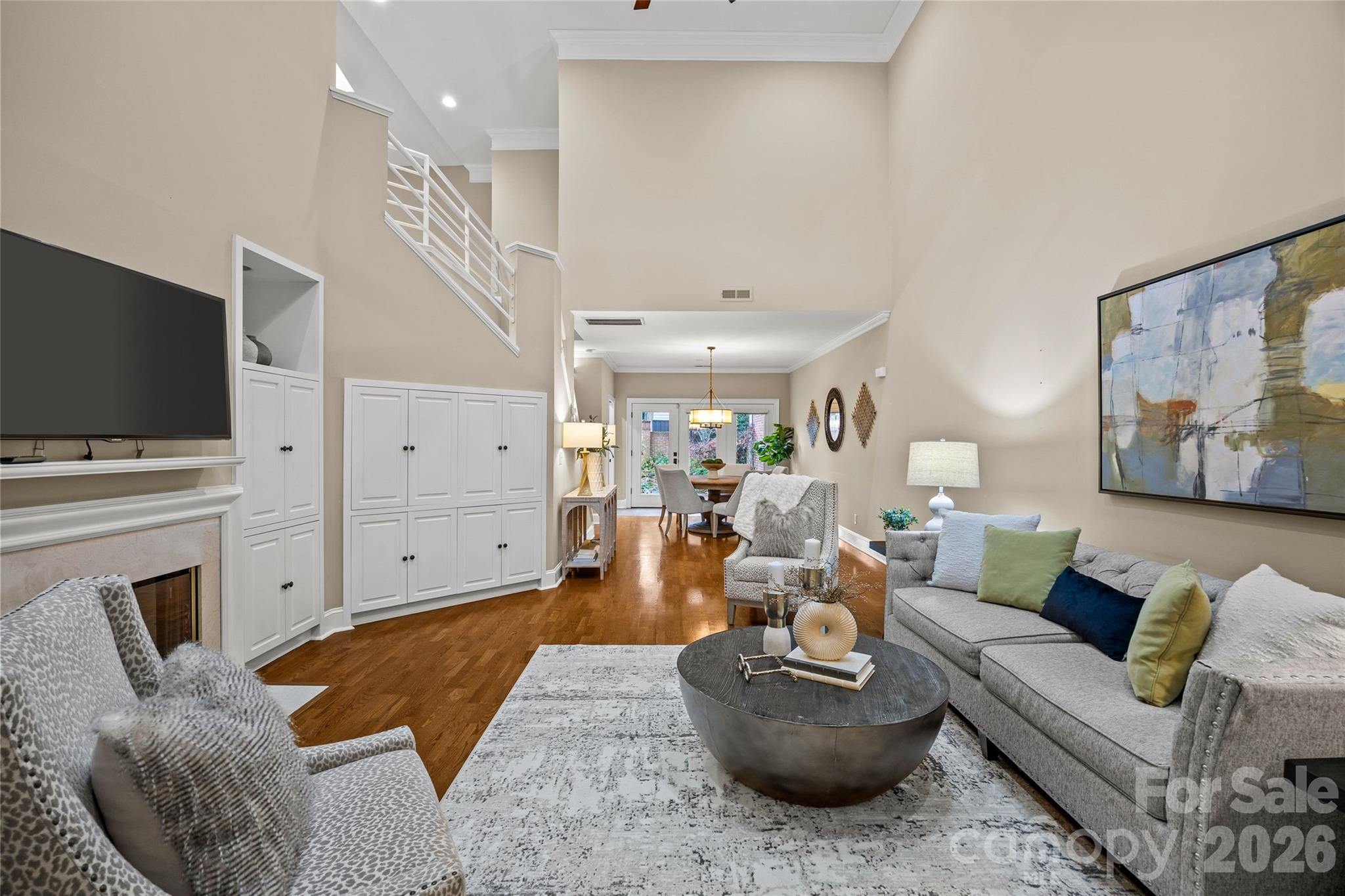 6029 Sharon Road Charlotte, NC 28210 - Photo 6 of 47 a living room with furniture and a flat screen tv