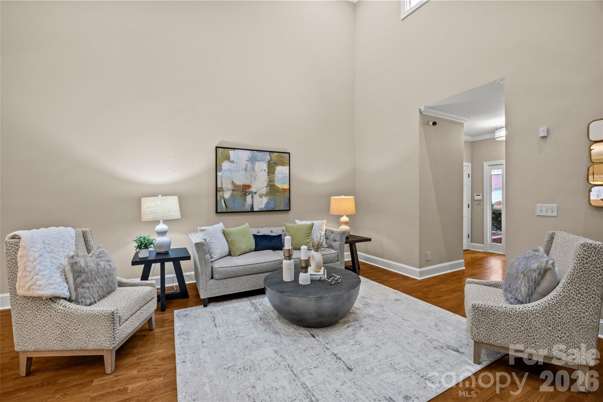 6029 Sharon Road Charlotte, NC 28210 - Photo 8 of 47 a living room with furniture and a wooden floor