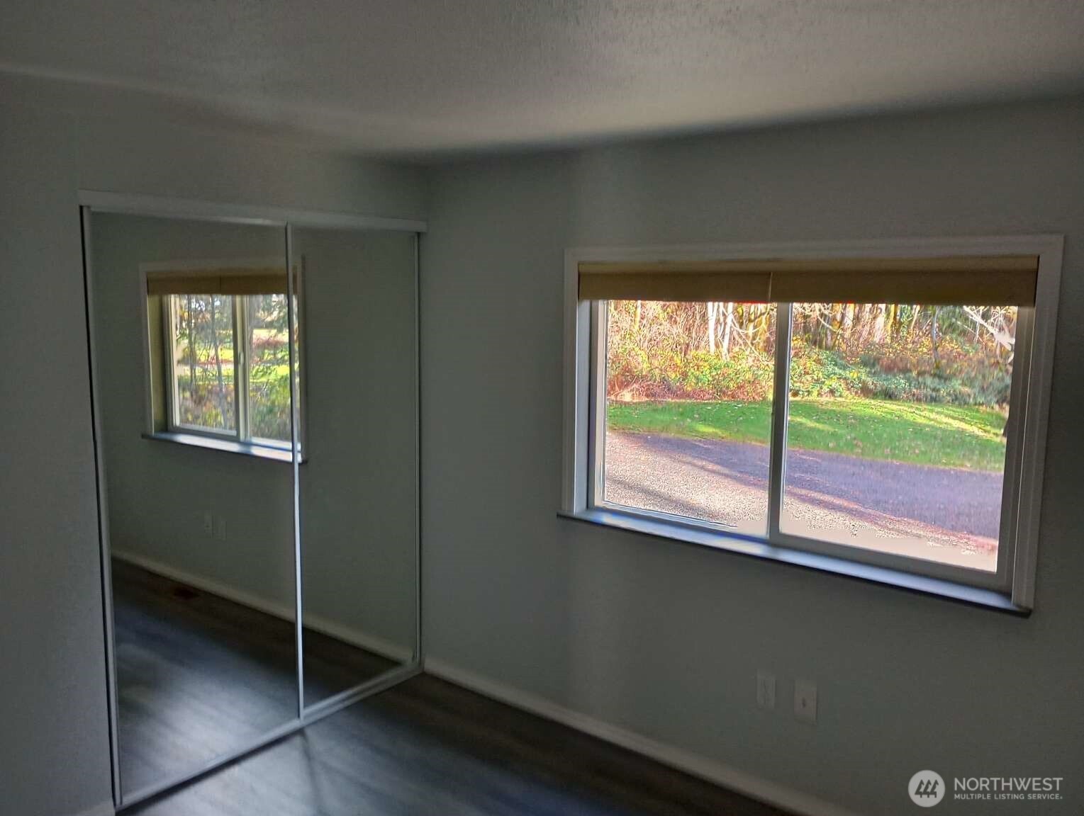 111 North Jorstad Creek Road Lilliwaup, WA 98555 - Photo 11 of 23 a view of an empty room with a window