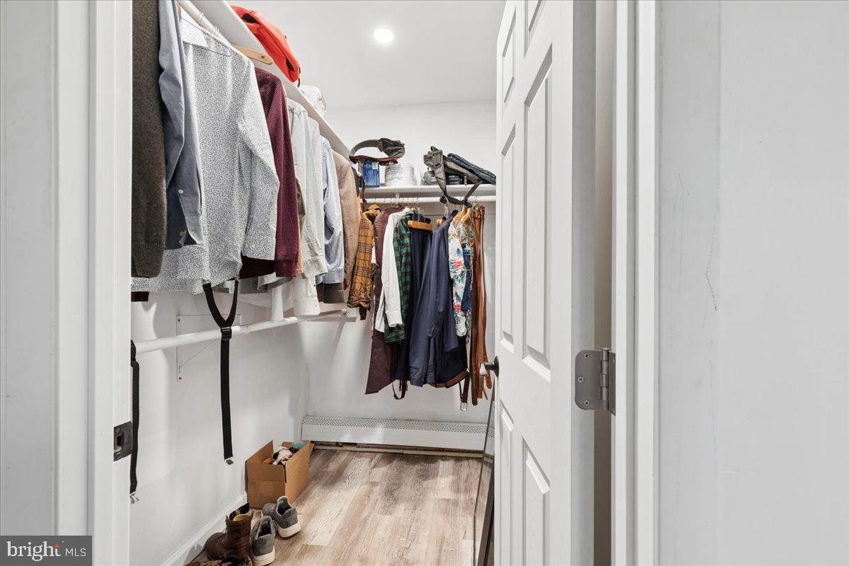 319 Gambrills Road Gambrills, MD 21054 - Photo 21 of 35 a view of walk in closet with clothes