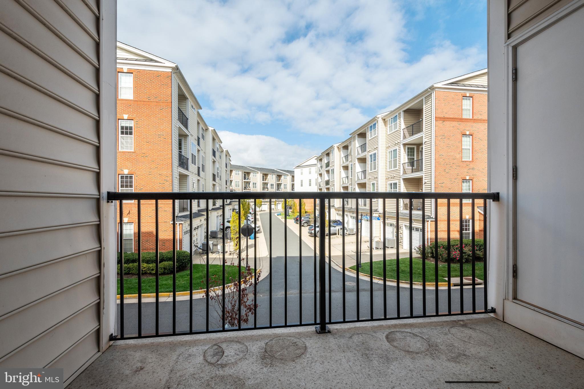 23485 Logans Ridge Terrace Ashburn, VA 20148 - Photo 13 of 16 Primary Bedroom Balcony