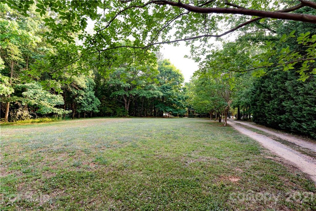 0 Holbrook Road, Unit 159 Fort Mill, SC 29715 - Photo 7 of 9 a view of a yard with a tree