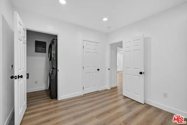 a view of a livingroom with wooden floor