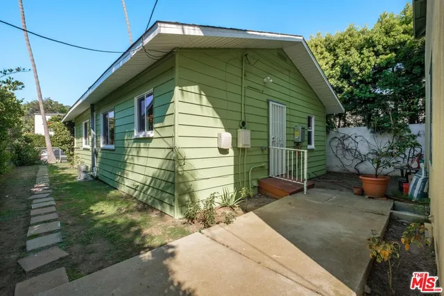 a view of a backyard with a garden