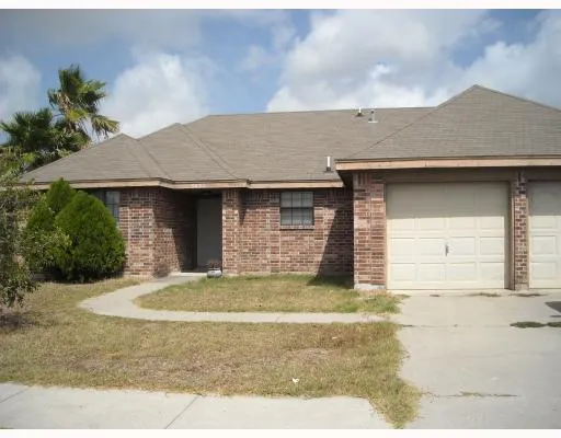a view of a house with a patio