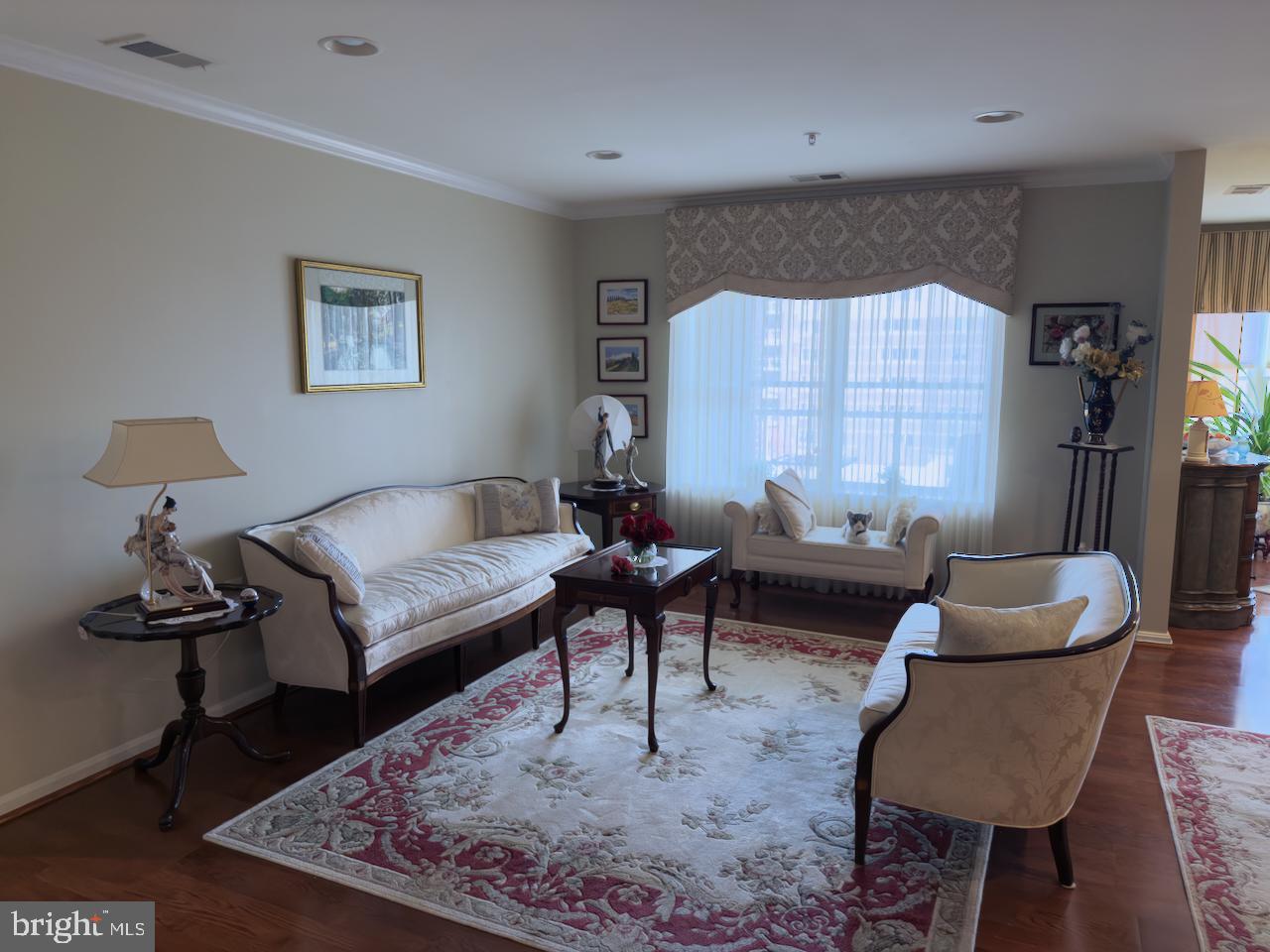 12251 Roundwood Road, Unit 601 Lutherville-Timonium, MD 21093 - Photo 13 of 41 Great room with hardwood flooring