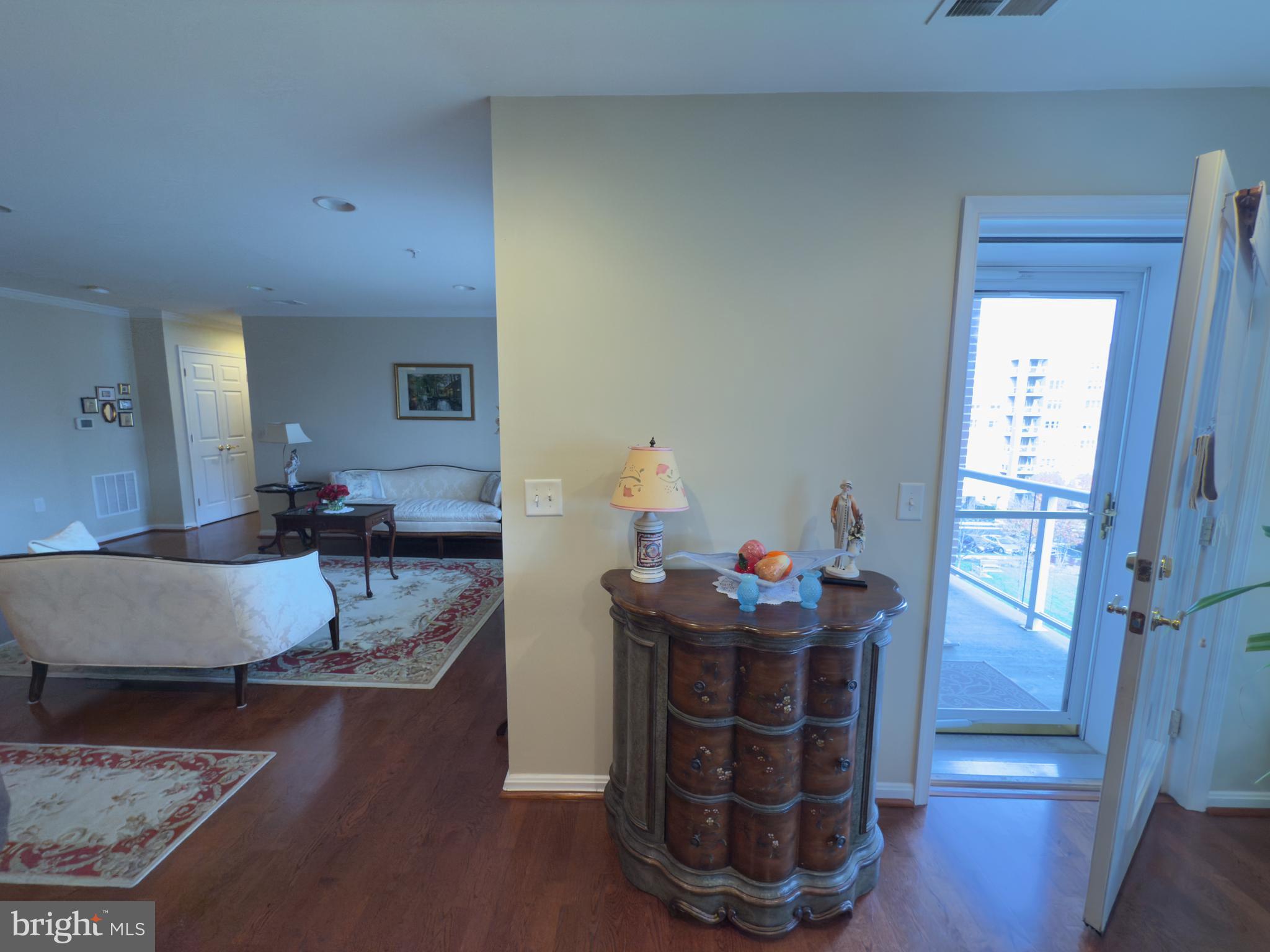12251 Roundwood Road, Unit 601 Lutherville-Timonium, MD 21093 - Photo 21 of 41 Family room access to balcony
