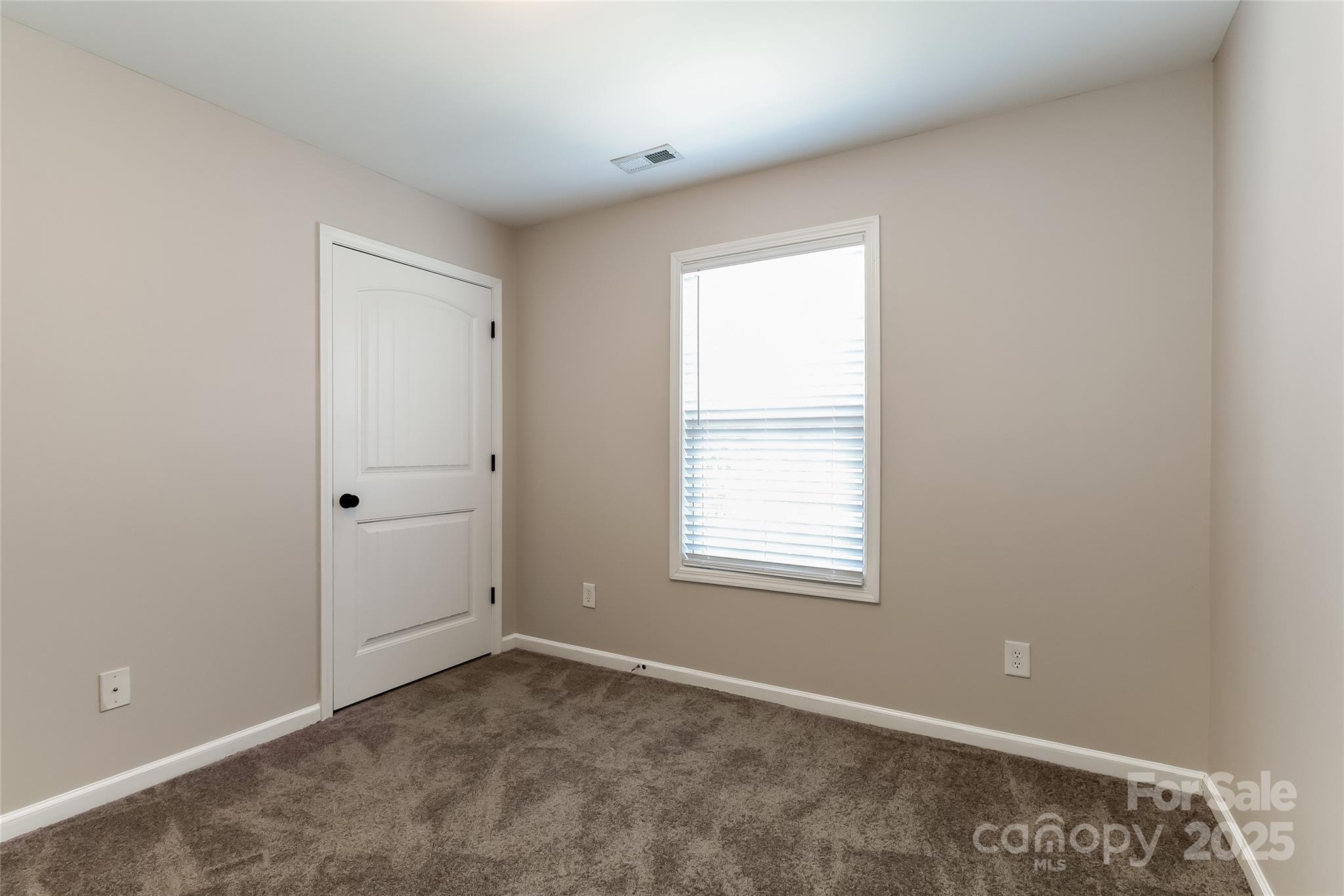 437 Danielle Way Fort Mill, SC 29715 - Photo 12 of 15 an empty room with a window