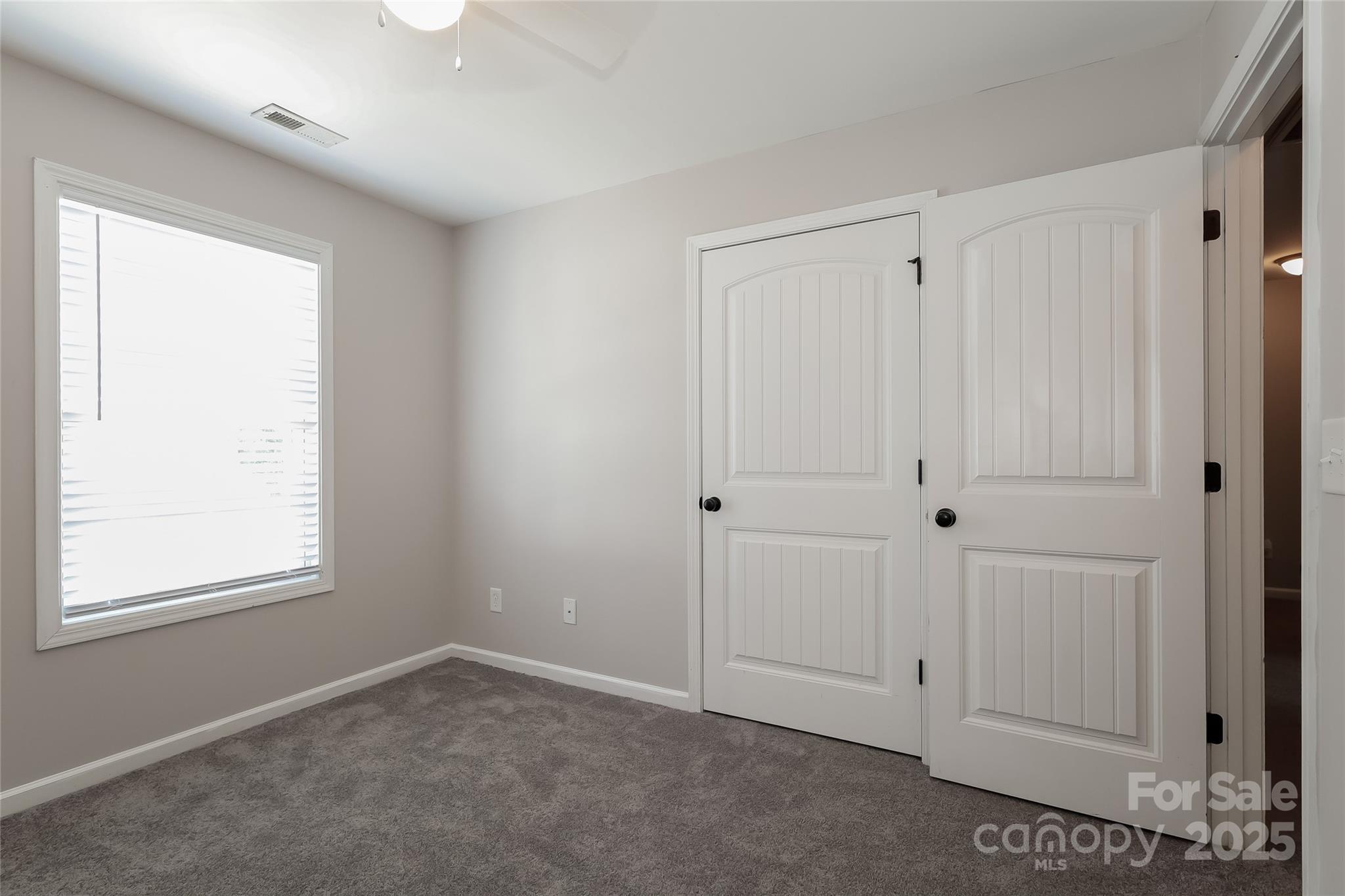 437 Danielle Way Fort Mill, SC 29715 - Photo 13 of 15 a view of an empty room with a window