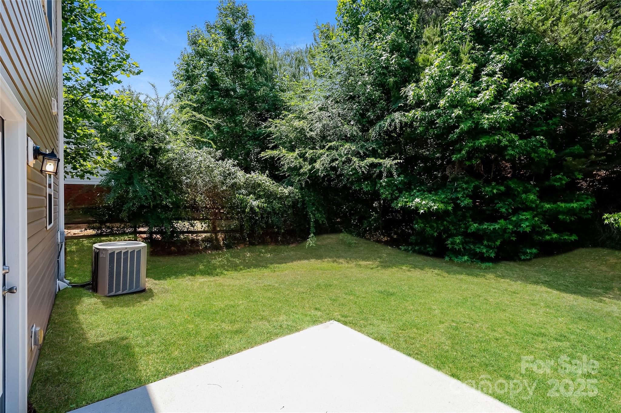 437 Danielle Way Fort Mill, SC 29715 - Photo 14 of 15 a view of backyard with a garden and entertaining space
