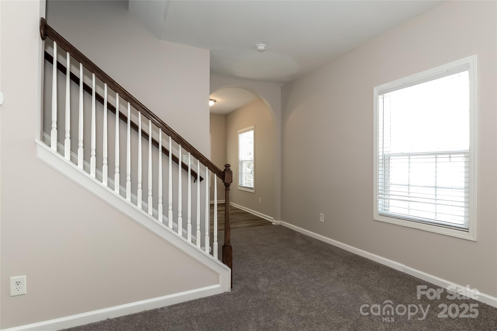437 Danielle Way Fort Mill, SC 29715 - Photo 3 of 15 a view of staircase with wooden floor and stairs