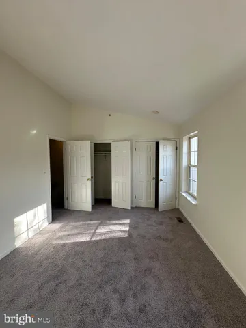 an empty room with closet