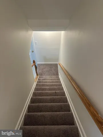 a view of a hallway with entryway