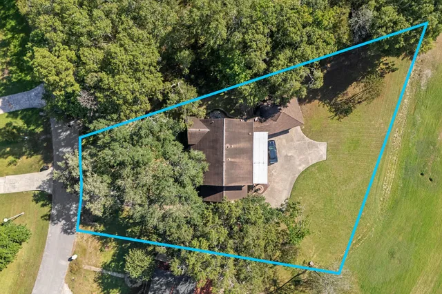 a view of a house with a street