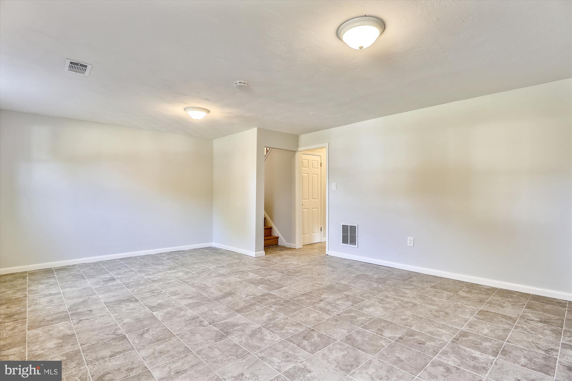 16111 Jerald Road Laurel, MD 20707 - Photo 22 of 46 Brand new ceramic tile on lower level