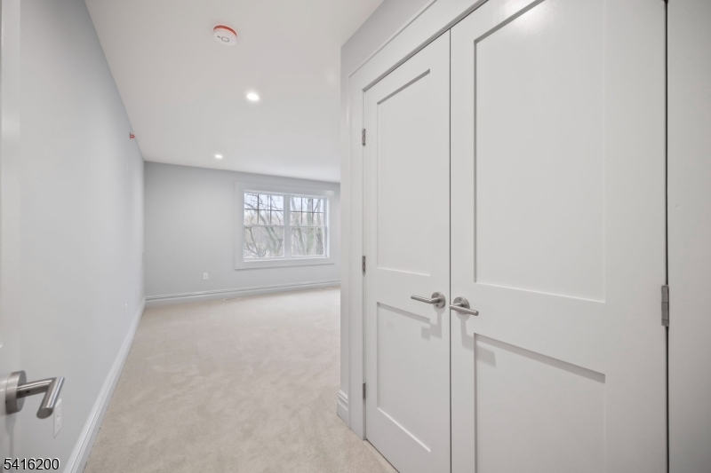 1209 Littleton Road, Unit D Morris Plains, NJ 07950 - Photo 19 of 23 an empty room with windows