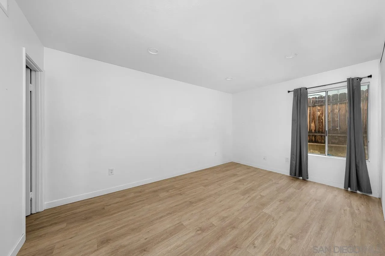 9927 Sadie Street Santee, CA 92071 - Photo 16 of 29 a view of empty room with wooden floor