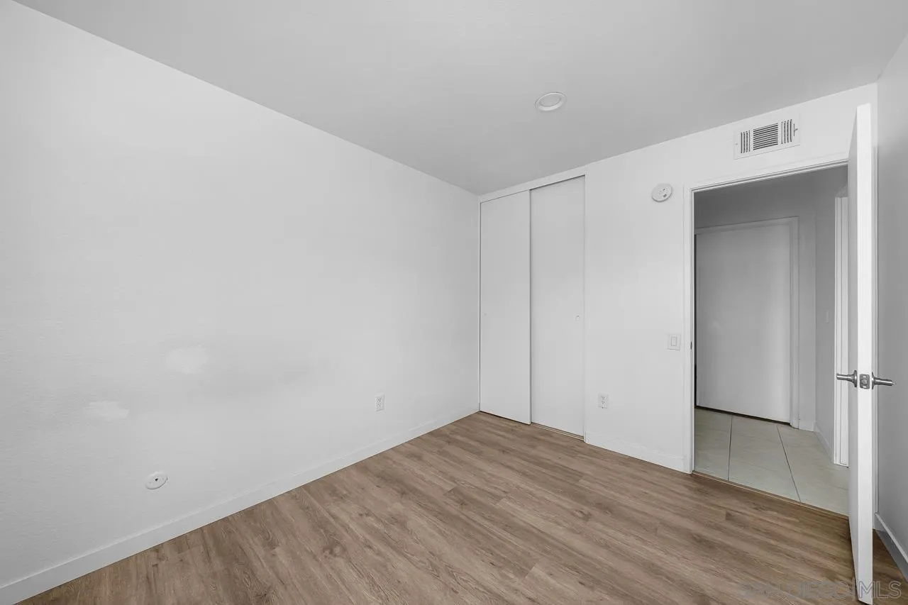 9927 Sadie Street Santee, CA 92071 - Photo 22 of 29 a view of empty room with wooden floor