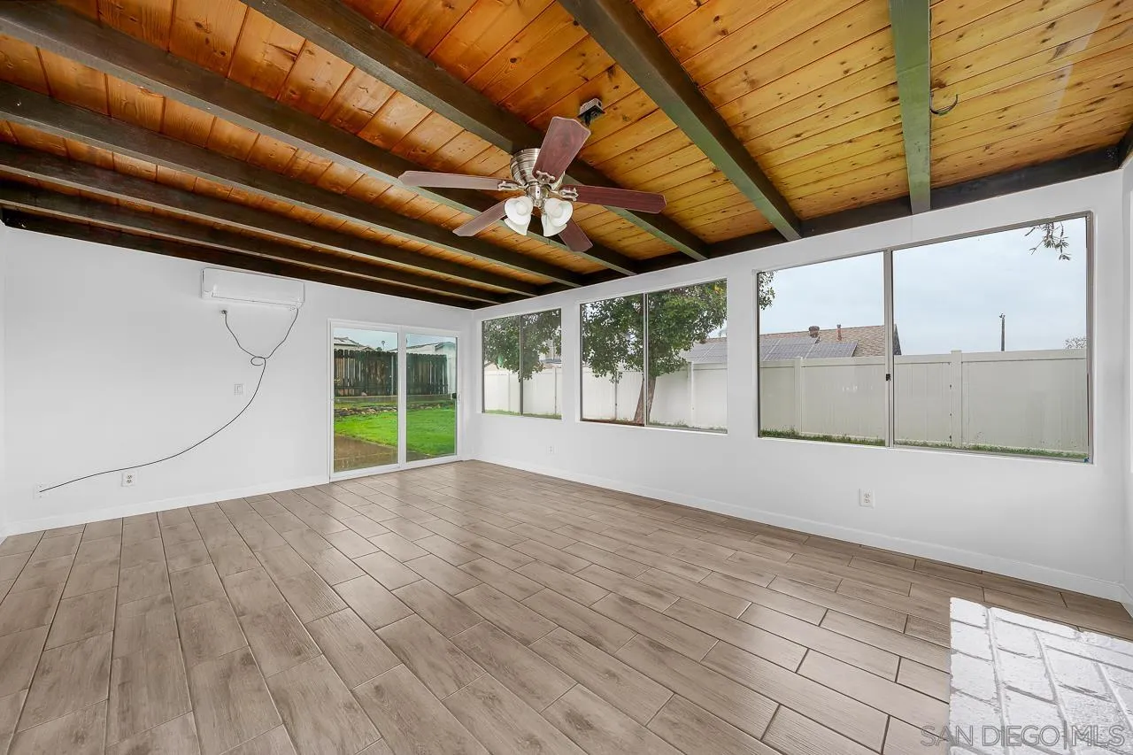 9927 Sadie Street Santee, CA 92071 - Photo 24 of 29 a view of empty room with wooden floor and fan
