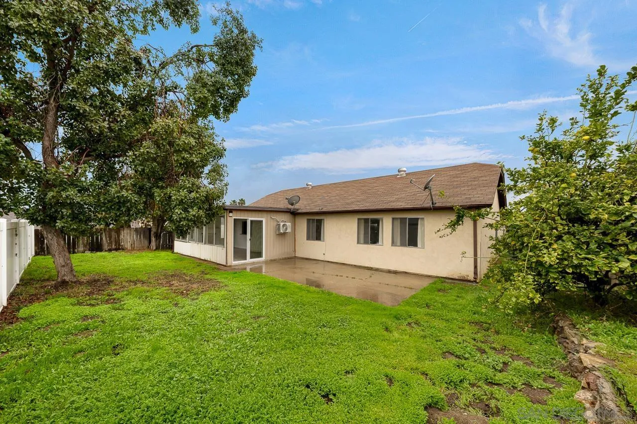 9927 Sadie Street Santee, CA 92071 - Photo 27 of 29 a view of a house with a big yard plants and large trees