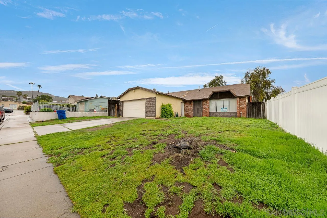 9927 Sadie Street Santee, CA 92071 - Photo 3 of 29 a house view with swimming pool