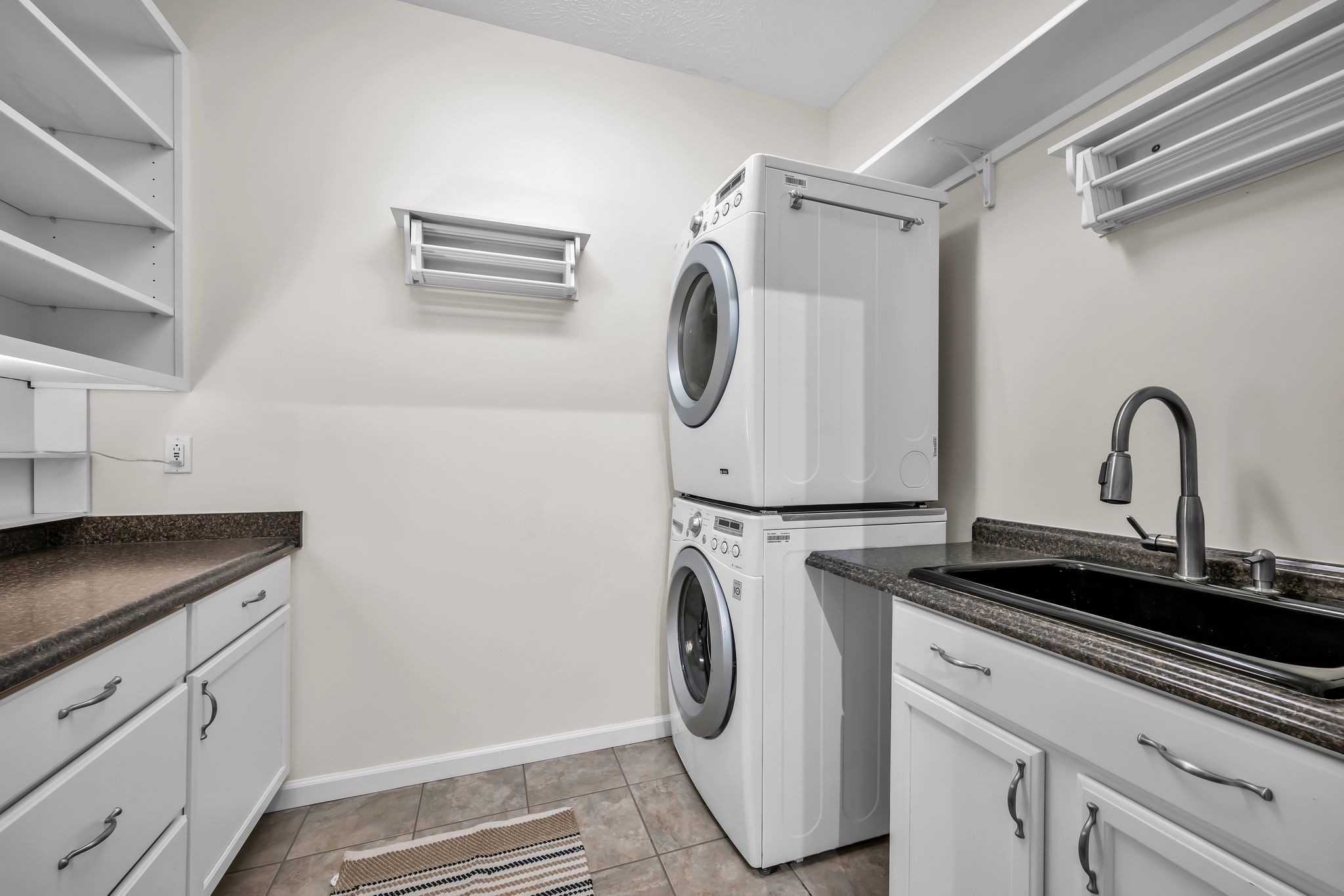 1958 Spencer Mill Road Burns, TN 37029 - Photo 20 of 38 a utility room with sink dryer and washer