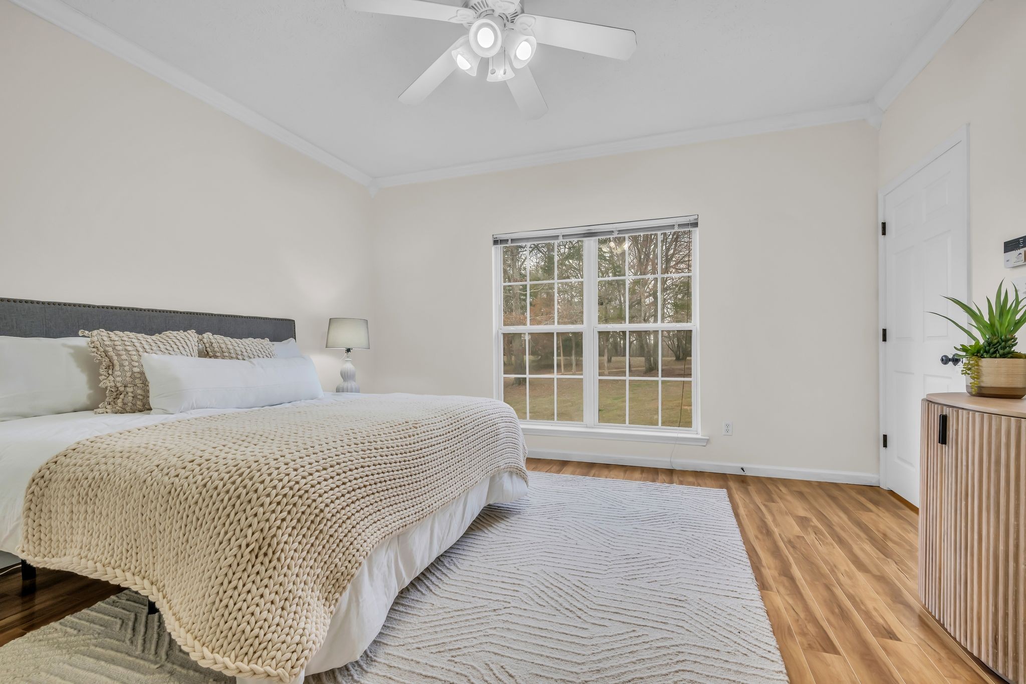 1958 Spencer Mill Road Burns, TN 37029 - Photo 23 of 38 a bedroom with a bed and a window