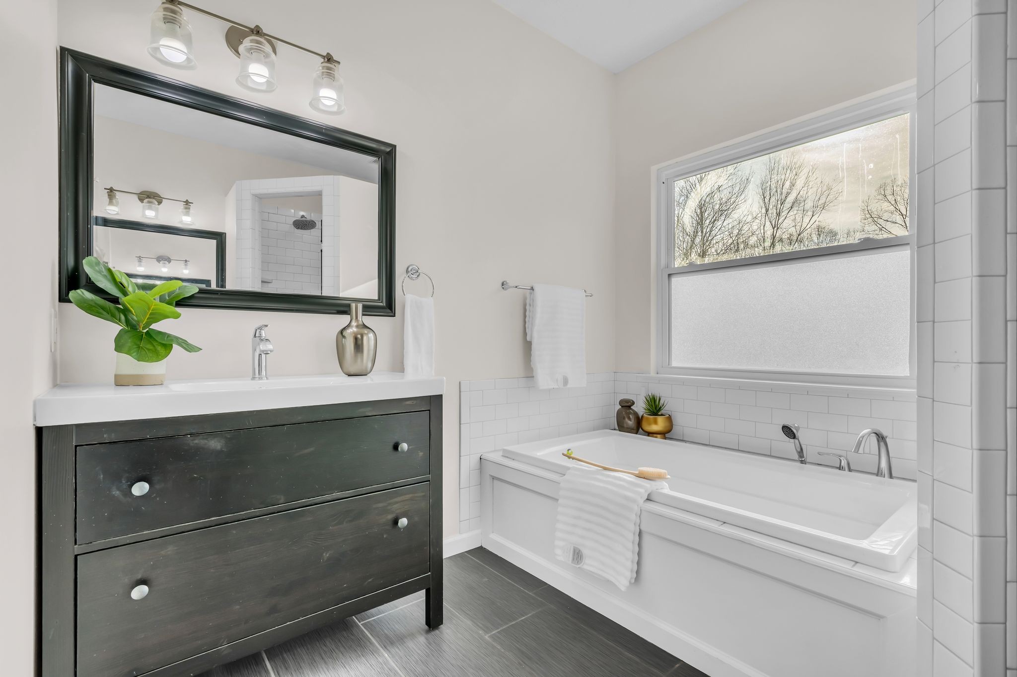 1958 Spencer Mill Road Burns, TN 37029 - Photo 25 of 38 a bathroom with a sink and a mirror