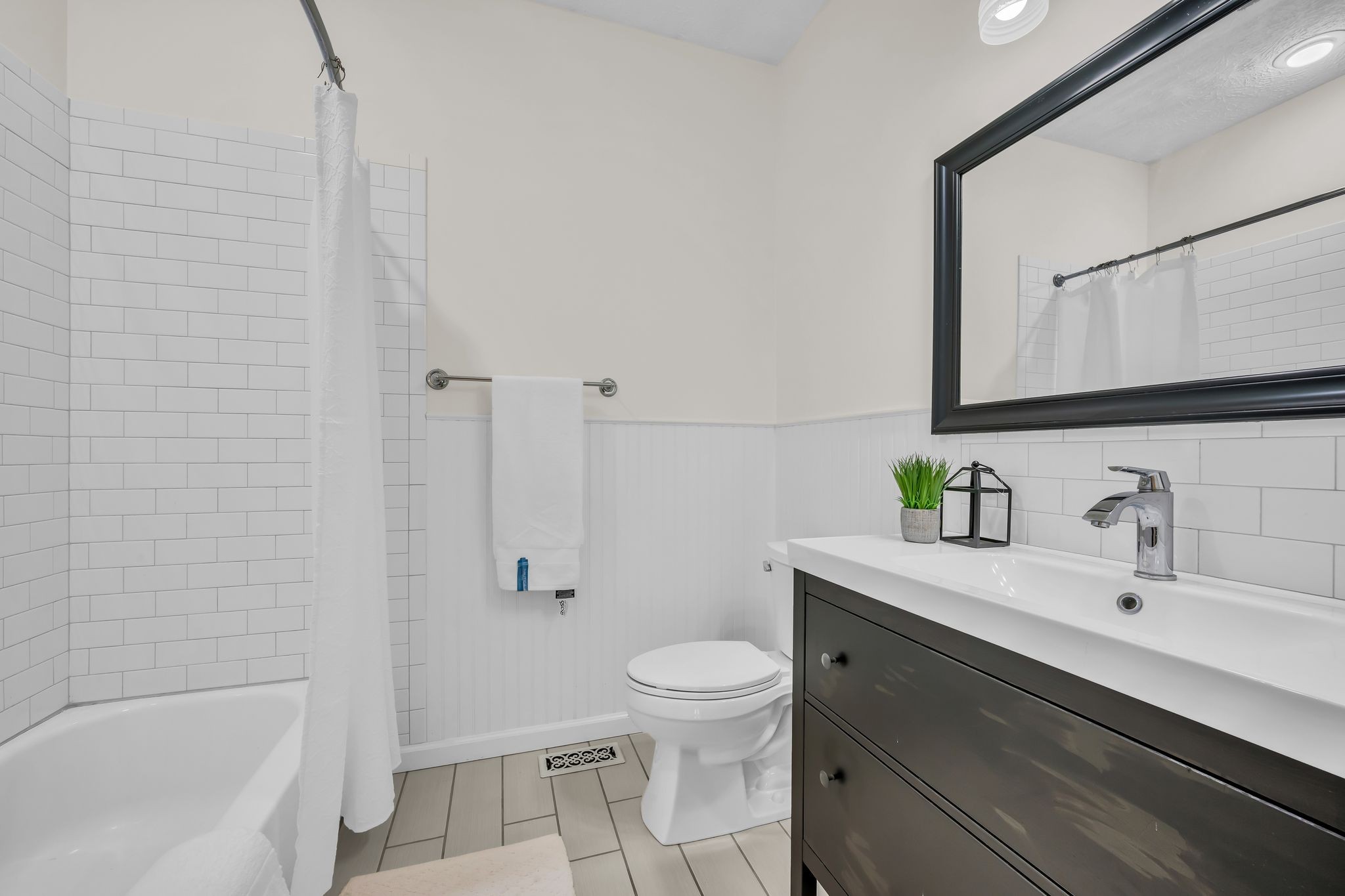 1958 Spencer Mill Road Burns, TN 37029 - Photo 31 of 38 a bathroom with a sink a toilet and shower