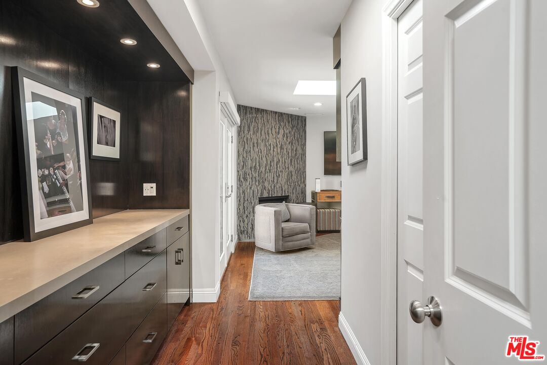 16722 Adlon Road Encino, CA 91436 - Photo 15 of 36 a spacious bathroom with a shower a sink and a large mirror