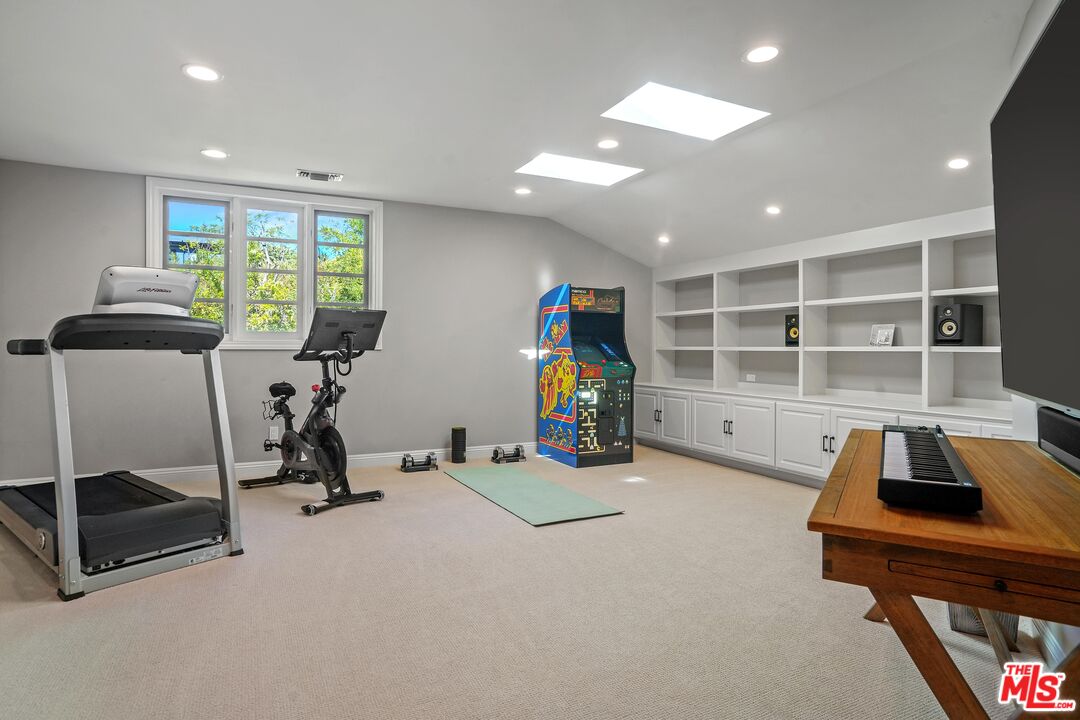 16722 Adlon Road Encino, CA 91436 - Photo 25 of 36 a view of a room with gym equipment