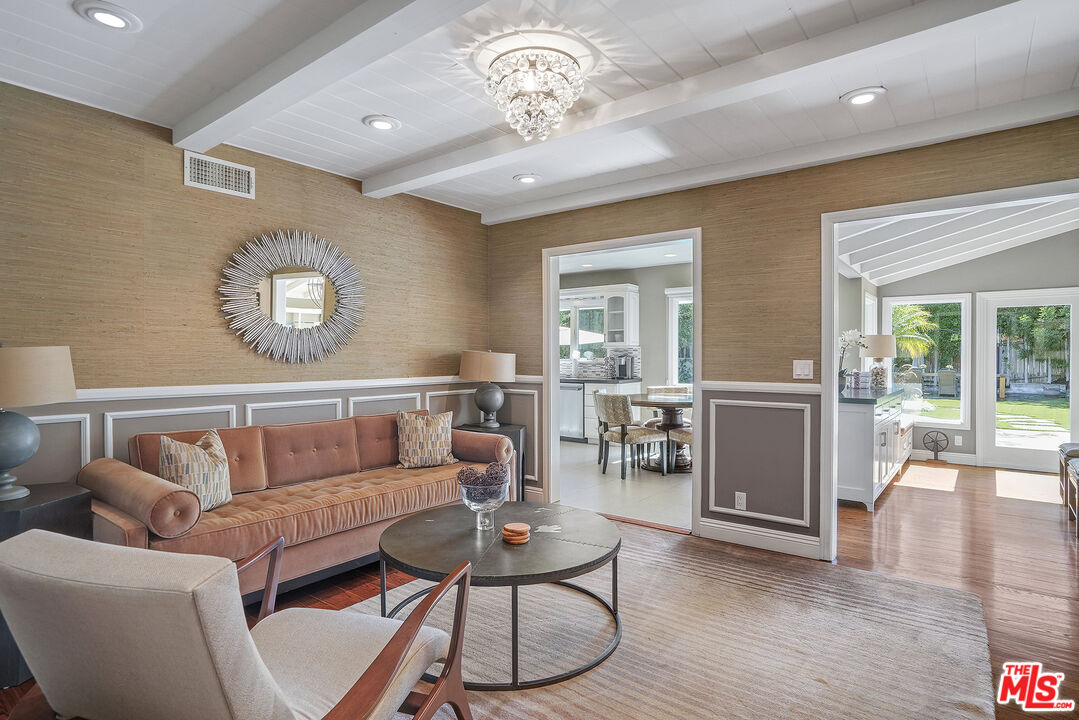 16722 Adlon Road Encino, CA 91436 - Photo 36 of 36 a living room with furniture a rug and a window