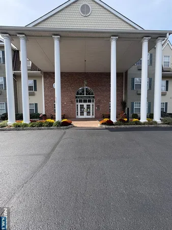 a view of a building with a street