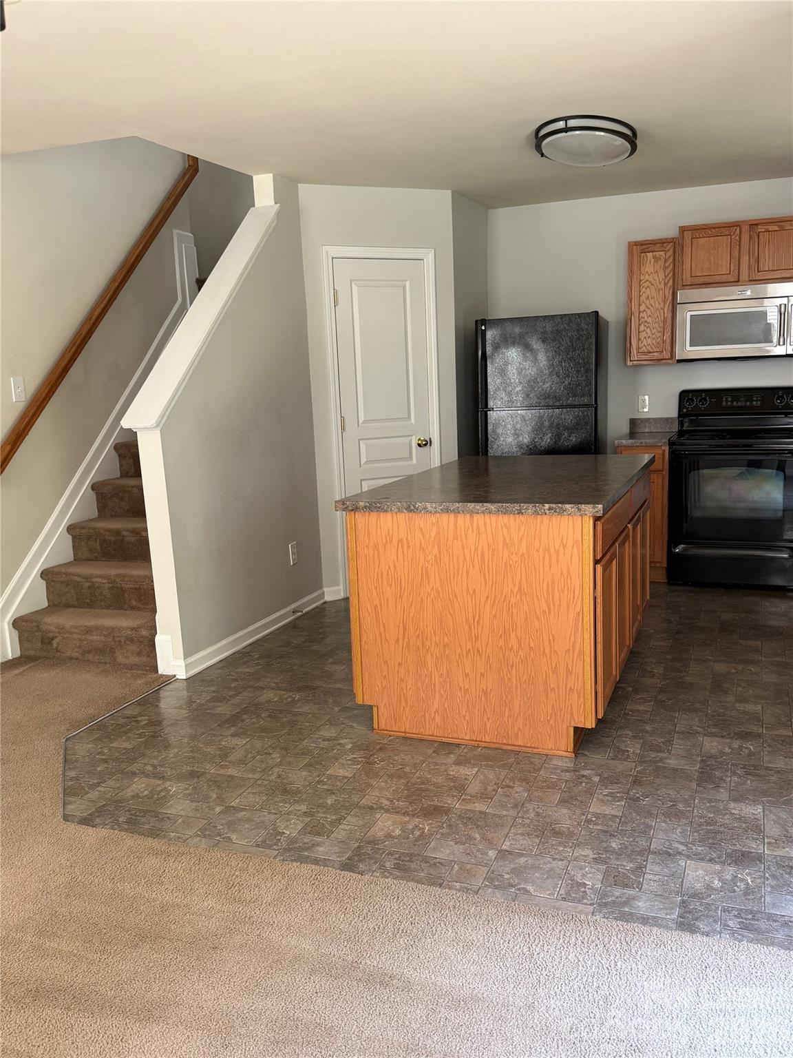 3329 Nevin Brook Road Charlotte, NC 28269 - Photo 3 of 13 a view of kitchen and wooden floor